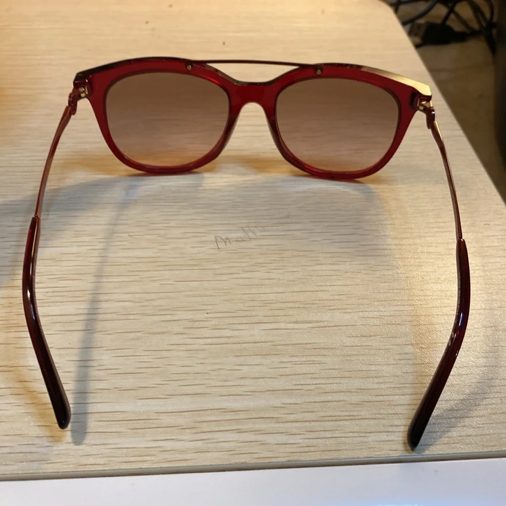 Tory Burch “Cranberry” sunglasses - New with case and dust bag.